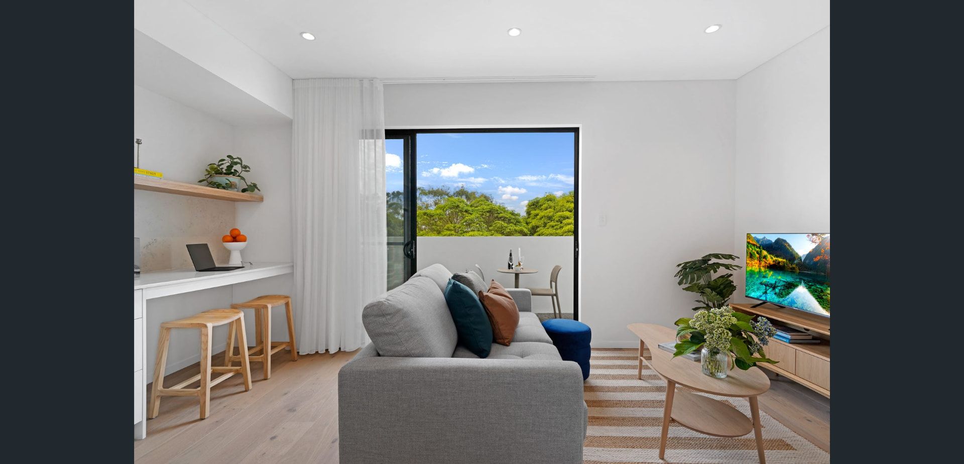 Living room opening to balcony at 327 Trafalgar St, Petersham