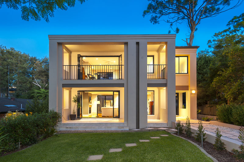 Completed two-storey home at twilight, 35 Warrimoo Ave, St Ives